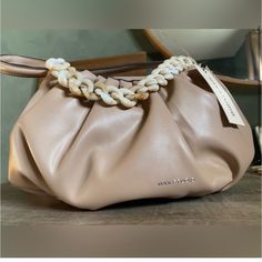 New With Tags. Very Roomy. Beige Shopping Bag With Pearl Handle, Beige Bags With Pearl Handle For Shopping, Trendy Neutral Satchel Shoulder Bag, Beige Clutch Shoulder Bag With Braided Handles, Beige Shoulder Clutch Bag With Braided Handles, Trendy Beige Bag With Pearl Handle, Everyday Beige Shoulder Bag With Pearl Handle, Beige Clutch Shoulder Bag For Errands, Beige Clutch Bag With Braided Handles