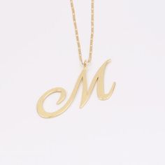 - Dimensions: letter height 108.1mm. width 82.6mm. Thickness 1.7mm.  Chain width 3.1mm. Thickness 0.9mm.- Material: gold and brass.- Quantity: 1pcs.- 2005-2130-1Different batches, sizes and colors may be different slightly. If you need accurate size or color, please contact me.EU factory focuses on servicing brands unique and quality items with the smallest MOQ, if you need to custom or personalized, the factory and craftsmen are here. Initial M, M Necklace, Mama Necklace, Necklace Mom, Gifts Personalized, Personalized Initials, 14kt Gold, Snake Chain, Name Necklace