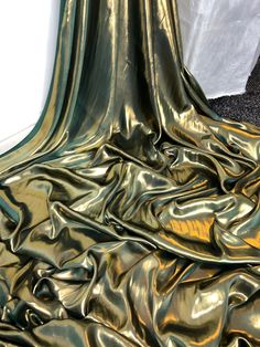 "1 mtr dark green/gold shimmer on satin fabric This is quality fabric and is silky satin fabric It is 58\" wide (147cm) This is ideal for dress making lining,bridal dress lining, waiste coat,decorations,table runners, and many other projects If more than one quantity is bought it will be sent in one continous length All items are dispatched within one working day (Please note i try my best to get exact color of the fabric there might be a slight different in color due to different montior screens and camera lighting) Any questions feel free to ask and please take time to look at my shop" Lame Fabric, Bridal Fabric, Club Wear, Teal And Gold, Dark Gold, Metallic Foil, Gold Shimmer, Satin Dress, Chiffon Fabric