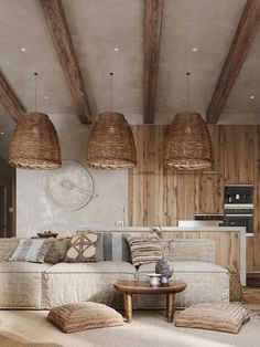 a living room filled with lots of furniture and wooden beams on the ceiling above it