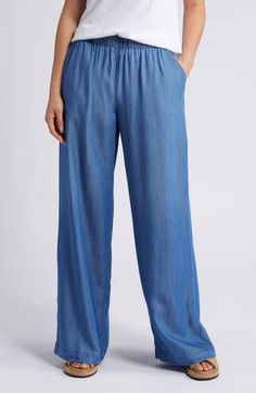 Lightweight chambray pants are cut with flowy wide legs and topped with a comfortable elastic waist. 31 1/2" inseam; 26" leg opening; 11 1/2" front rise; 15" back rise (size Medium) Elastic waist Front slant pockets; back welt pockets 100% Tencel® lyocell Tencel lyocell is a sustainably produced fiber made with closed-loop processing Machine wash, line dry Imported Strawberry Blonde Hair Color, Chambray Pants, Summer Pants Outfits, High Waist Wide Leg Pants, Blonde Hair Shades, Linen Blend Pants, Wide Legs, Pull On Pants, Linen Pants