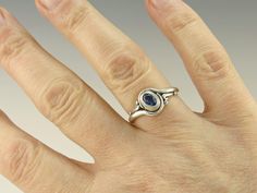 Sterling Silver Blue Sapphire Ring/ One of a Kind Ring/ September Birthstone/ Gift for Her/ Victorian Ring/ Sapphire Ring/ 925 Sapphire Ring R1068- Sterling Silver Ring with a 6 x 4 mm Blue Sapphire, Size 7. I can size it to fit, just contact me. No charge to size down, and no charge for one size up. Pretty Blue Sapphire which is September Birthstone. Would make a Great Gift for Her or Teenage Girl. It is One of a Kind made by me from start to finish. The top of the ring measures 10 mm and the b Hand Forged Oval Sapphire Ring For Anniversary, Hand Forged Blue Sapphire Ring For Anniversary, Hand Forged Blue Sapphire Ring Gift, Elegant Hand Forged Sapphire Ring Gift, Elegant Hand Forged Sapphire Ring, Elegant Hand Forged Round Sapphire Ring, Anniversary Blue Hand Forged Sapphire Ring, Blue Hand Forged Rings For Anniversary, Hand Forged Round Sapphire Ring Gift