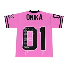 a pink jersey with black numbers on the front and white letters on the back that says onka