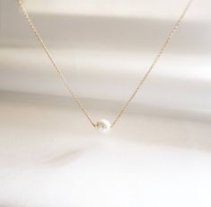 Simple but very elegant necklace that is perfect for bridal gifts and everyday wear.// ITEM DETAILS //*This listing item for White Pearl Necklace, but you can select the defferent colors of the pearl (see photo4)- Genuine White Swarovski Crystal Pearl measures 8mm- 14K Gold Fill, 14k Rose Gold Fill, Sterling Silver chain and findings  Also, available in Gold Plated, Rose gold Plated, Silver Plated chain and findings- Beautiful gift wrapped with note in the box// LENGTH //- Length shown in the ph White Gold Dainty Necklace For Party, Dainty White Gold Necklace For Party, Delicate White Gold Necklace For Party, Minimalist Pearl Necklace With Clavicle Chain For Parties, Dainty Pearl Chain Bridal Necklace For Formal Occasions, Elegant Necklace With Delicate Chain For Gift, White Clavicle Chain Bridal Necklace For Formal Occasions, Classic Rose Gold Necklaces For Wedding, Classic Rose Gold Necklace For Wedding