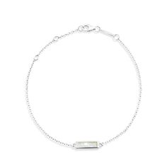 Wear your travels, experiences, and destination aspirations every day with our Delicate Dune Collection. This sweet, Dune Bar Bracelet is perfect for stacking and is handcrafted with .925 sterling silver and your choice of sand or earth elements from thousands of iconic and memorable locations around the globe. Choose from our Sandbank or send your own sand or element for a bespoke design that is uniquely yours. .925 Sterling Silver Inspired by our best-selling designs One size fits most Cable c Minimalist Sterling Silver Pearl Bracelet, Everyday White Sterling Silver Chain Bracelet, Sterling Silver Stackable Chain Bracelet, Sterling Silver Stackable Diamond Bracelet As Gift, Adjustable Sterling Silver Diamond Bracelet For Everyday, Stackable Sterling Silver Diamond Bracelet As Gift, Stackable Sterling Silver Diamond Bracelet Gift, White Minimalist Sterling Silver Bracelet, Minimalist White Sterling Silver Bracelet