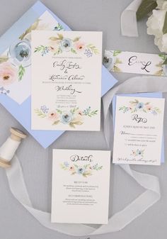 the wedding stationery is laid out and ready to be used as an applique