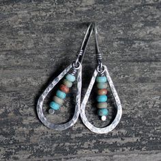 "Sterling silver jasper rustic dangle earrings Hand forged and hammered ¾\" x 1 ¼\" rustic sterling silver teardrops dangle along with sterling wrapped 3x5mm earthy jasper roundels hanging from hand wrapped sterling silver elongated hooks. VERY light weight. Total length 2\"." Nickel Free Bohemian Beaded Earrings, Nickel-free Bohemian Beaded Earrings, Nickel Free Bohemian Beaded Earrings For Everyday, Bohemian Nickel Free Beaded Earrings For Everyday, Everyday Bohemian Nickel-free Beaded Earrings, Handmade Rustic Earrings For Jewelry Making, Rustic Handmade Earrings For Jewelry Making, Handmade Teardrop Earthy Earrings, Bohemian Wire Wrapped Beaded Earrings For Everyday