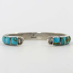 Sterling Silver Cuff Bracelet set with a Row of Turquoise. .25” Cuff Width5.375��” Inside Measurement, plus .875” opening(6.25" Total Circumference - Small-Medium) Zuni Jewelry, Concho Belt, Navajo Jewelry, Native Jewelry, Turquoise Cuff, Sterling Silver Cuff Bracelet, Sterling Silver Cuff, Pendant Rings, Silver Cuff Bracelet