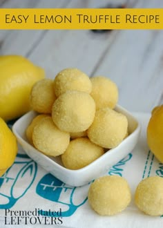 lemon truffle recipe in a small white bowl on a table with lemons