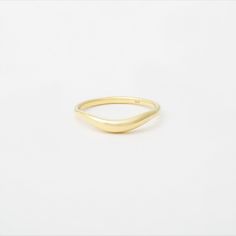 A soft, sculptural curve, designed to fit nicely next to a engagement ring, or with any of our Ovate Rings. Makes for a beautiful, simple wedding band. Elegant Wedding Signet Ring Hand Forged, Minimalist Open Band Dome Ring For Wedding, Minimalist Dome Ring For Wedding With Open Band, Minimalist 14k Gold Ring With Smooth Finish, Curved Wedding Rings With Polished Finish, Minimalist Hand Forged Signet Ring For Anniversary, Hand Forged Minimalist Anniversary Rings, Minimalist Hand Forged Anniversary Ring, Curved 14k Gold Rings For Anniversary