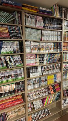 there are many books on the shelves in this room and one is full of them