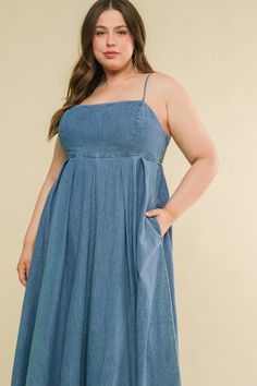 An artfully washed midi dress in soft denim, boasting a sleek straight neckline and delicate shoulder straps finished with inverted pleats. The exquisite back tie closure adds a touch of elegance to this effortlessly chic piece.Details:Self : 90% Cotton 10% PolyesterSize & Fit- Model is 5`7" And Wearing Size Small- Measurements Taken From Size Small- Approx. Length: 51" Square Neck Medium Wash Denim Dress For Summer, Spring Denim Dress With Square Neck In Medium Wash, Spring Medium Wash Denim Dress With Square Neck, Spring Medium Wash Square Neck Denim Dress, Spring Square Neck Medium Wash Denim Dress, Spring Dresses With Spaghetti Straps And Medium Wash, Medium Wash Cotton Dress With Adjustable Straps, Spring Denim Dress With Adjustable Straps, Denim Midi Dress