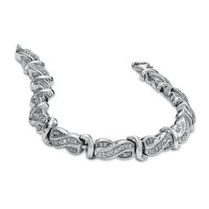 Make any occasion a special occasion with the gift of this dazzling diamond bracelet. Swirling links of fine sterling silver are lined with shimmering princess-cut diamonds and alternate with polished "S"-shaped links. Boasting a total diamond weight of 1 ct., this bracelet is certain to make a lasting impression. Buffed to a bright luster, this 7.0-inch style secures with a lobster claw clasp. Princess Cut Diamonds, Princess Cut, Lobster Claw, Sterling Silver Bracelets, Diamond Bracelet, Swirl, Special Occasion, Diamonds, Bracelet