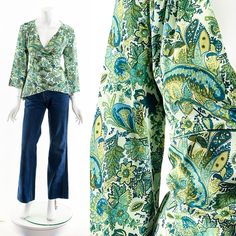 "y2k emerald green paisley boho blouse plunging neckline 3/4 length bell sleeves faux wrap front gathering along shoulder yoke Fits like: small-medium Material: Polyester Spandex Condition: Great Clipped on Mannequin: No ✂ SIZE + FIT ✂ Length: 24\" / 61 cm Shoulders, seam to seam: 17\" / 86 cm Sleeve Length: 19\" / 97 cm Bust: 40\" / 51 cm Waist: 35\" / 44 cm All measurements are taken with garment lying flat. ALWAYS refer to measurements as vintage sizes run can vary greatly from today's modern Blouse Y2k, Hippie Blouse, Dress Form Mannequin, Y2k Boho, Green Paisley, Boho Blouse, Bohemian Hippie, Green Shirt, Dress Form