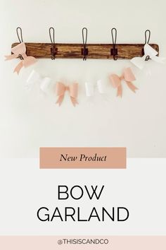 the bow garland is hanging on a wall with text overlay that reads, new product bow garland