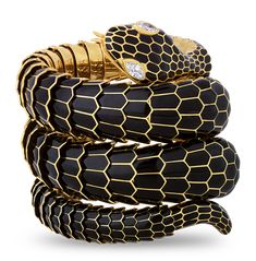 This eye-catching vintage bangle takes the form of a slithering snake. The handcrafted gold and black enamel bracelet perfectly simulates the scaly skin of the captivating reptile, and the serpent's eyes are formed of glittering marquise-cut white diamonds totaling approximately 0.50 carat. Set in 18K yellow gold. 6 3/4" diameter Jewelry Design Drawing, Vintage Bangles, Diamond Eyes, Snake Bracelet, Enamel Bracelet, Gold Snake, Fine Jewels, Antique Earrings, Victorian Jewelry