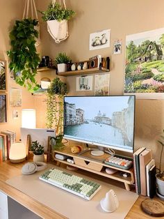 a computer monitor sitting on top of a wooden desk