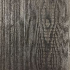 an image of wood textured with grey paint