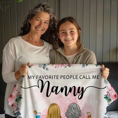 two women holding up a sign that says, my favorite people call me nanny