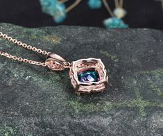 - Metal: Solid gold(9K/14K/18K white/yellow/rose gold),925 sterling silver, platinum available- Main Stone: 8mm cushion Lab Alexandrite- Accent Stone: moissanites or diamonds G-H,Clarity SI-VS- Chain: 16+2 inches. The chain can be adjustable to 18 Inches.- Can be personalized: Yes Rose Gold Moissanite Pendant Jewelry, Exquisite Pendant Necklace With Halo Setting, Exquisite Pendant With Halo Setting Jewelry, Moissanite Pendant Jewelry With Halo Design, Moissanite Pendant With Halo Design, Moissanite Halo Pendant Jewelry, Rose Gold Moissanite Jewelry As Gift, Rose Gold Moissanite Jewelry Gift, Gift Rose Gold Moissanite Jewelry