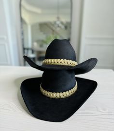 This cowgirl hat is the perfect addition to your western-themed outfit. Made of high quality suede, it only looks great but is also long lasting. Tejana hat type: this hat features a classic tejana design, which adds a touch of authenticity to your western look. Fitted Hat: the fitted styles ensures that this hat stays comfortably in place all day long.  Care Instructions:  to keep this cow girl hat looking its best, simply dry clean it as needed.  Fall accessory must-have: the perfect accessory for fall season for ladies who love the western style fashion. Western Fedora With Short Brim For Western-themed Events, Western Curved Brim Hat For Rodeo, Western Hat Band For Rodeo With Curved Brim, Western Curved Brim Hat Bands For Rodeo, Western Hats For Ranch, Fitted Western Hat For Western-themed Events, Western Felt Hat For Rodeo, Western Style Felt Hat For Rodeo, Western Style Rodeo Hat With Short Brim