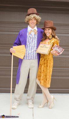 a man and woman dressed up in costumes