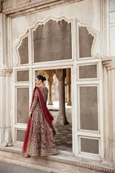 Luxury Bridal Wedding Dress in Red Lehenga Choli Dupatta Style is a breathtaking attire that has the perfect blend of a traditional and glamorous look. Lavish designs and fine details of zardosi, dabka, naqshi, and mukaish on this Bridal Dress make it an epitome of beauty and grace for the wedding. Red Anarkali Gown For Traditional Ceremonies, Traditional Kundan Dress With Sheer Dupatta, Floor-length Gown With Dupatta For Traditional Ceremonies, Anarkali Kundan Gown For Traditional Ceremonies, Red Anarkali Gown With Intricate Embroidery, Red Traditional Unstitched Gown, Bollywood Red Unstitched Gown, Red Gown With Dabka Work Styled As Saree, Traditional Red Gown With Dupatta