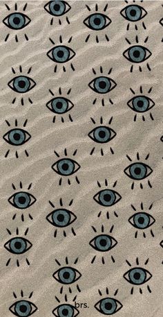 an eye pattern is shown in the sand