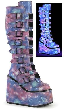 Swing your way into the club with this series of platform wedged boots and shoes, with buckles and straps and decals galore! Vegan Purple-blue reflective PU leather 5 1/2 inch platform wedge Knee length 8 straps w/ buckles Metal plates Side zip U.S women's sizing-refer to size chart for more info Please note: these shoes are in our warehouse, ready to ship. If your size isn't available, your can preorder a pair here. Platform Knee High Boots, Demonia Boots, Goth Shoes, Goth Boots, Purple Boots, Gothic Boots, Demonia Shoes, Attitude Clothing, Patent Boots