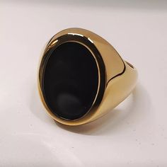 Handcrafted Men's Black Onyx Oval Gold Tone Signet Ring - Stone Dimensions: Oval 15*12 - Band New With Tags! - Limited Quanity -100% Authentic - Full Retail Package With All Accesories Black Polished Finish Jewelry For Business, Black Polished Jewelry For Business, Luxury Oval Onyx Signet Ring, Luxury Oval Signet Ring With Black Enamel, Luxury Oval Black Enamel Signet Ring, Masculine Black Jewelry For Gift, Modern Black Jewelry For Business, Timeless Black Jewelry For Business, Formal Black Oval Cabochon Signet Ring