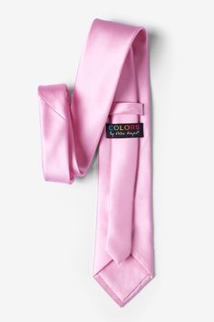 Suit up to perfection with the beautiful solid ties by Peter Hayer. This microfiber pink frosting tie features a refined satin finish, giving just the right amount of sheen that's perfect for formal events, important business meetings, or weddings. This durable tie is never short on style and you'll be receiving compliments for years to come. Imported. Classic Pink Tie For Business, Elegant Pink Standard Tie And Accessories, Pink Adjustable Standard Tie For Suits, Elegant Pink Ties For Semi-formal Occasions, Classic Adjustable Pink Tie, Pink Frosting, Suit Up, Satin Finish, The Pink