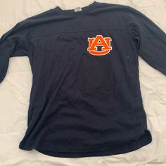 Auburn University Women’s Medium Long Sleeve Shirt, New With Tags Blue Spring College Tops, Blue Long Sleeve Shirt For College, Long Sleeve Blue Shirt For College, Navy Cotton Top For College, Navy Cotton Tops For College, College Long Sleeve Relaxed Fit Shirt, Casual Navy Shirt With Letter Print, Blue Graphic Print Top, Spring College Style Long Sleeve Tops