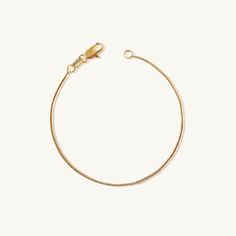 A simple, dainty gold bracelet. Our Gold Snake Bracelet is one of our most loved due to it's versatility! Add this staple to your collection of everyday essentials- wear it anywhere! Metal: 18k gold-filled 1/20 Size: 7 inches long with Lobster Clasp Hypoallergenic and water-resistant jewelry Minimalist Snake Chain Bracelet With Lobster Clasp, Dainty Yellow Gold Bracelet For Everyday, Minimalist 14k Gold Bracelets, Minimalist Everyday Gold Plated Bracelet, Everyday Minimalist Gold Plated Bracelet, Minimalist Gold-plated Bracelets With Lobster Clasp, Everyday Adjustable Snake Chain Bracelet, Minimalist Gold Plated Bracelet With Lobster Clasp, Minimalist Yellow Gold Bracelet With Lobster Clasp