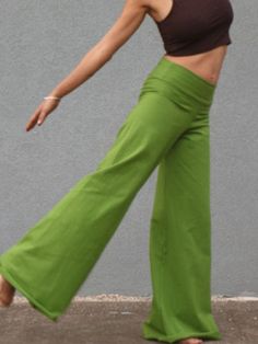 A High-Quality Festival Bell Bottom Unique Green Yoga Pants, Festival Boho Clothing, Hand Made Out of Amazing Cotton Lycra, Beautiful Loose Pants, Perfect for the up-and-coming season. These beautiful and relaxed boho pants are the perfect style for your everyday visit to a café, a good yoga session, as well as a quick visit to a festival nearby. A unique and gorgeous loose pants, perfectly tailored to fit and compliment all body types, from size S to size XL. It is loose and comfortable to wear, and the fabric is a soft Cotton Lycra that feels great on the body. Now is the perfect time for you to purchase these amazingly comfy pants, and to enjoy them everywhere. ------------------------------------------------------------------------------------------------- Sizes: S = 36 M = 38 L = 40 X High Waist Non-stretch Solid Capris, Summer High Waist Yoga Pants With Pockets, High Waist Yoga Pants With Pockets For Summer, Green Loose Wide Leg Cotton Pants, Green Baggy Wide Leg Cotton Pants, High Waist Solid Color Yoga Pants For Summer, Solid Color Long Yoga Pants For Summer, Solid Color Summer Yoga Pants, Baggy Solid Yoga Pants For Spring