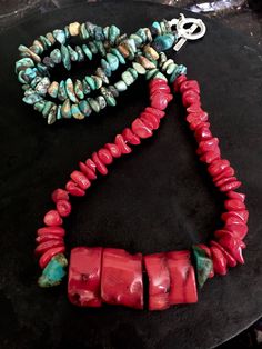 Red Coral and Turquoise Necklace  Every piece of jewelry I make is made with specific meaning. In this piece I chose to use red coral. For the Mexica red coral is symbolic of  fertility and can be used for blood conditions.  I also chose to use turquoise because it is a protective stone that protects against outside energy not belonging to you.   Every piece of jewelry I make for myself is finished with a lava rock and 3 pieces of turquoise at the end of each strand.  The Mexica acknowledge lava rocks as our abuela(o)s, our grandmothers and grandfathers. They remind us of the knowledge and wisdom that our ancestors carried which we also carry as we are connected to them.   This piece is also finished with lava rock and turquoise, sharing with you the intention of the strength and wisdom of Southwestern Style Red Necklace For Gift, Red Southwestern Turquoise Necklace For Gift, Artisan Hand-strung Red Coral Necklace, Handmade Turquoise Necklace With Red Coral, Handmade Turquoise And Red Coral Necklace As Gift, Handmade Turquoise Necklace With Red Coral For Gift, Unique Hand-strung Red Coral Necklaces, Unique Red Gemstone Bead Necklaces, Bohemian Red Turquoise Single Strand Necklace