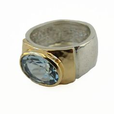 Natural Blue Topaz Oval Gemstone, inlaid in Wide Solid sterling silver ring decorated with Yellow gold, a stunning Ring! 3 reasons why JEWELRY IS A GOOD IDEA: #1-THIS IS THE GIFT THAT CAN LAST A LIFETIME My Jewelry is Fine Jewelry that will stay beautiful, strong, and unique for years! #2- IT'S A 3D PIECE OF LOVE One Duerry Jewelry is like a reminder of 1000 hugs. #3- IT WILL ALWAYS HAVE A GOOD VALUE My jewelry is made with Sterling silver, 9K, 14K, 18K Gold, Precious, and Semi-Precious gemstone Square Diamond Earrings, Garnet Ring Silver, Wide Silver Ring, Sterling Silver Garnet Ring, Bold Rings, Ring Blue, Small Rings, Blue Jewelry, Men's Ring