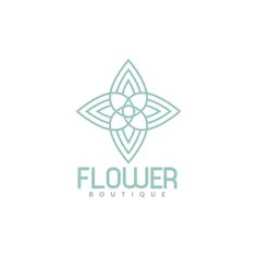 the flower boutique logo is shown in green and blue colors, with an intricate design