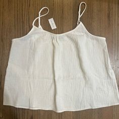 Nwt Banana Republic White Tank-Size Large. Perfect To Wear By Itself Or Under A Nice Sweater Or Blazer. White Cotton Summer Camisole, White Chic Tank Top With Relaxed Fit, White Camisole Tops For Vacation, Chic White Relaxed Fit Tank Top, White Cotton Tank Top For Daytime, White Relaxed Fit Tank Top For Beach, White Cotton Chic Camisole, White Cotton Beach Top, White Casual Camisole Top