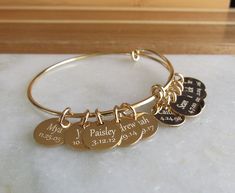 Personalized Adjustable Gold Bangle, Gold Charm Bracelet, Bridesmaid Bracelet, Custom Bracelet Gift, Initial Bracelet, Birthday Gift Ideas ❤️**ABOUT THIS BRACELET** **SEE MEASUREMENTS BELOW** This adjustable personalized bracelet features a shiny and polished gold plated bangle that is beautifully adorned with up to six 14kt gold filled 1/2 inch engraved discs. This is a feminine but sturdy bangle made from heavy 13 gauge metal. There are two double loops that you can gently squeeze together to Adjustable Gold Bracelet For Bridesmaid Gift, Adjustable Gold Bracelets For Bridesmaids, Personalized Gold Charm Bracelet For Bridesmaid Gift, Gold Bangle Charm Bracelet For Birthday, Adjustable Bangle For Bridesmaid Gift, Adjustable Gold Charm Bracelet Birthday Gift, Adjustable Gold Charm Bracelet For Birthday, Gold Charm Bracelet For Bridesmaid Mother's Day Gift, Charm Bracelet For Bridesmaid Gift