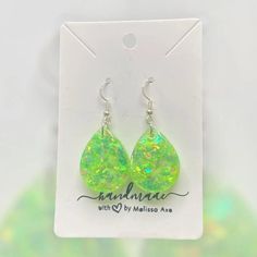 Each earring is handcrafted with care.  * Handcrafted with high-quality resin for durability and beauty. * Lightweight design for comfortable all-day wear. * Hypoallergenic for sensitive ears. * Each earring is unique and may be slightly different from what is pictured. No two earrings are completely alike. Material: * UV resin * Glitter * Hypoallergenic and nickel free Stainless Steel hardware Care: *To clean your earrings, use a damp cloth and wipe gently. *Remove the earrings before showering or swimming. *Avoid using chemicals, perfume, jewelry cleaners, or any aerosol products. Do not hesitate to send me a message if you have any questions. Please check my other listings at https://designsbymelissaa.etsy.com. Trendy Hypoallergenic Teardrop Earrings, Handmade Resin Teardrop Earrings As Gift, Trendy Hypoallergenic Dangle Teardrop Earrings, Trendy Nickel-free Teardrop Earrings, Handmade Teardrop Resin Earrings, Handmade Resin Teardrop Earrings, Hypoallergenic Resin Drop Earrings, Trendy Teardrop Earrings As A Gift, Resin Teardrop Earrings For Gifts