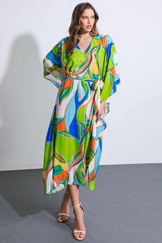 A printed woven kaftan dress featuring V neckline and self sash belt Transform into a statement: Indulge in the epitome of elegance with this printed woven kaftan dress. Featuring a V neckline and a self sash belt, it exudes sophistication and effortless style. Details:Self : 100% PolyesterSize & Fit- Model is 5`8" And Wearing Size Small- Measurements Taken From Size Small- Approx. Length: 53" Sash Belts, Sash Belt, Beautiful Sights, Kaftan Dress, V Neckline, Green Dress, Effortless Style, Fitness Models, Blue Green