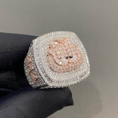 Iced Out Logo Ring, Two Tone Hip Hop Ring For Him, Championship Ring for Men, Custom Number/Logo/ Name Ring in GRA Certified Moissanites Item Details: Ring Size: DM Me Your Ring Size   Metal: 925 Sterling Silver Stone: GRA Certified Moissanites OR AAAAA Cubic Zirconia (CZ) Stone Quality: VVS1 D Color Pristine White Ring Passes Diamond Tester  Description: Our custom iced out Ring are meticulously crafted from premium 925 sterling silver. At IMJ India, we take pride in offering unparalleled quality and craftsmanship, ensuring each piece is a true work of art. Key Features: 1. Premium Stone Options: Choose from two exceptional stone qualities:    - AAAAA+ Highest Quality Cubic Zirconia: Radiate brilliance and sophistication with our premium cubic zirconia stones, carefully selected for their Number Logo, Queen Rings, Mens Pinky Ring, Hip Hop Rings, Expensive Jewelry Luxury, Logo Name, Championship Rings, Name Ring, Letter Ring