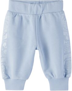 French terry sweatpants. · Rib knit elasticized waistband · Single-pocket styling · Rib knit cuffs · Graphic pattern printed at outseams · Machine-wash Supplier color: Light blue/White Versace Size : child's height 0/3M: 22 / 56 cm 3/6M: 24.5 / 62 cm 6/9M: 27 / 68 cm 9/12M: 29 / 74 cm 12/18M: 31.5 / 80 cm 18M: 34 / 86 cm 18/24M: 34 / 86 cm 24M: 36 / 92 cm 36M: 38.5 / 98 cm Blue Sweats With Elastic Waistband For Winter, Blue Winter Sweats With Elastic Waistband, Blue Cotton Sweatpants With Ribbed Cuffs, Casual Blue Bottoms With Logo Waistband, Blue Cotton Pants With Ribbed Cuffs, Blue Bottoms With Ribbed Cuffs For Winter, Blue Winter Bottoms With Ribbed Cuffs, Blue Bottoms With Elastic Cuffs For Loungewear, Blue Jogging Bottoms