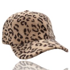 Dani & EmFuzzy Leopard Baseball Cap An adorable faux fur fuzzy leopard baseball cap.This super stylish cosy hat will keep you looking good and feeling warm. Comfortable and fashionable and perfect for casual wear, daily wear, outer wear, work wear, travel, and sport’s. Features a soft faux fur material which will keep your head warm and adds that special accent touch to any favorite top, sweater, jeans, winter coat, jacket, vest, scarf or more. An absolutely gorgeous addition to any wardrobe! One Size - Circumference: 56cm-60cm/22.0"-23.6"; Adjustable; Great fit for most teens and adults. Design : The leopard print baseball hat features an all over leopard print design Trendy Winter Baseball Cap, Casual Faux Fur Beanie Hat, Trendy Winter Flat Cap Baseball Cap, Casual Faux Fur Beanie, Trendy Brown Baseball Cap For Winter, Trendy Winter Baseball Cap With Curved Brim, Trendy Brown Winter Baseball Cap, Casual Hats With Adjustable Faux Fur Lining, Casual Adjustable Hat With Faux Fur Lining