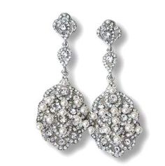 pair of earrings with white pearls and diamonds