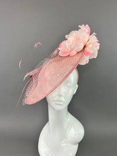 Blush pink sinamay fascinator adorned with two shades of pink blooms. made to be worn on the right side. Fascinators are one size fits all. All Sales are final. don’t forget to follow us on instagram @TheHatHive Pink Sinamay Fascinator For Formal Occasions, Pink Sinamay Hat For Evening, Pink Headpieces For Royal Ascot Event, Pink Mini Hat For Evening, Pink Fascinator With Handmade Flowers For Races, Pink Feminine Fascinator For Evening, Pink Feminine Fascinator For Royal Ascot, Pink Feminine Fascinator For Kentucky Derby, Pink Feminine Fascinator For Wedding