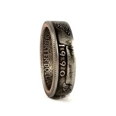 a wedding ring made out of an old coin