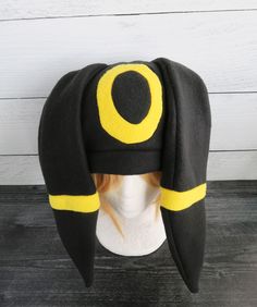 These hats are made from fleece and interfacing in the ears but still have floppiness to them and do not stand up (sorry but I do not offer this option). ⫸ Perfect for: fans, cold weather, costumes, or conventions. Very warm! ⫸ Size: Fits anyone age 5+, one size fits most. Circumference about 24-25 in. ⫸ Care instructions: I recommend hand wash but should be fine in machine wash cold. All hats are made in a smoke-free, pet-free environment. All hats are made with a sewing machine. Patterns and d Shiny Umbreon, Pokemon Hat, Fleece Hat, Cold Weather, Sewing, Hats, Pattern