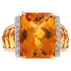 Size: 7 3/4 Brand: Bellarri Metal Content: 18k Yellow Gold & 18k White Gold Stone Information Natural Citrine Treatment: Heating Cut: Cushion Checkerboard Color: Orangey Yellow Natural Citrines Treatment: Heating Cut: Rectangular Cushion Color: Orangey Yellow Natural Diamonds Cut: Round Brilliant Color: F - G Clarity: VS1 - VS2 Stone Note: (twenty-eight small accents) Style: Solitaire with Accents Measurements Face Height (north to south): 5/8" (15.7mm) Rise Above Finger: 13/32" (9.6mm) Weight: Orangey Yellow, Fine Jewlery, Rectangular Cushion, Rise Above, La Face, Natural Citrine, Gold Stone, Happy Colors, Brilliant Colors