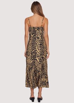 The Helena Love Maxi Dress embodies everlasting style for years to come! Its sheath silhouette offers a scoop neck bodice with functional tunnel and tie. Best suited for a smaller chest size, the back details smocking to ensure a comfortable fit. A classic brown and black zebra print shapes this body and features a slanted bottom ruffle for effortless movement. Fully lined with side zipper and adjustable shoulder straps are added functions to assist with your lifestyle needs! WDWC33919 Imported Vacation Midi Dress With Smocked Back And Straight Neckline, Beach Midi Dress With Tie Back And Straight Neckline, Vacation Dresses With Ruched Detail And Straight Neckline, Vacation Dresses With Ruched Straight Neckline, Black Dress With Straight Neckline For Brunch, Beach Midi Dress With Ruched Square Neck, Beach Maxi Dress With Tie Back And Straight Neckline, Vacation Dress With Tie Back And Straight Neckline, Casual Midi Dress With Ruched Back